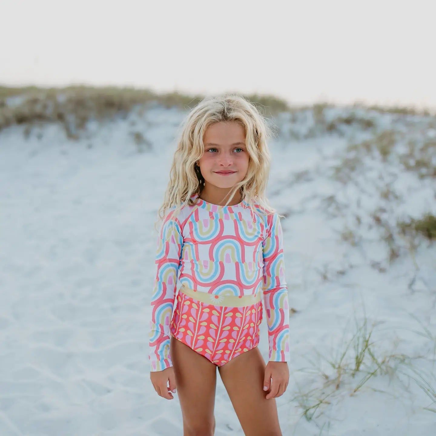 Oopsie Daisy Kid Coral Rainbow Zip Rash Guard | Vagabond Apparel Boutique