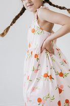 Mila & Rose Tangerine Ruffle Cross Back Dress | Vagabond Apparel Boutique